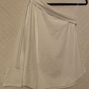 One shoulder white collared blouse.